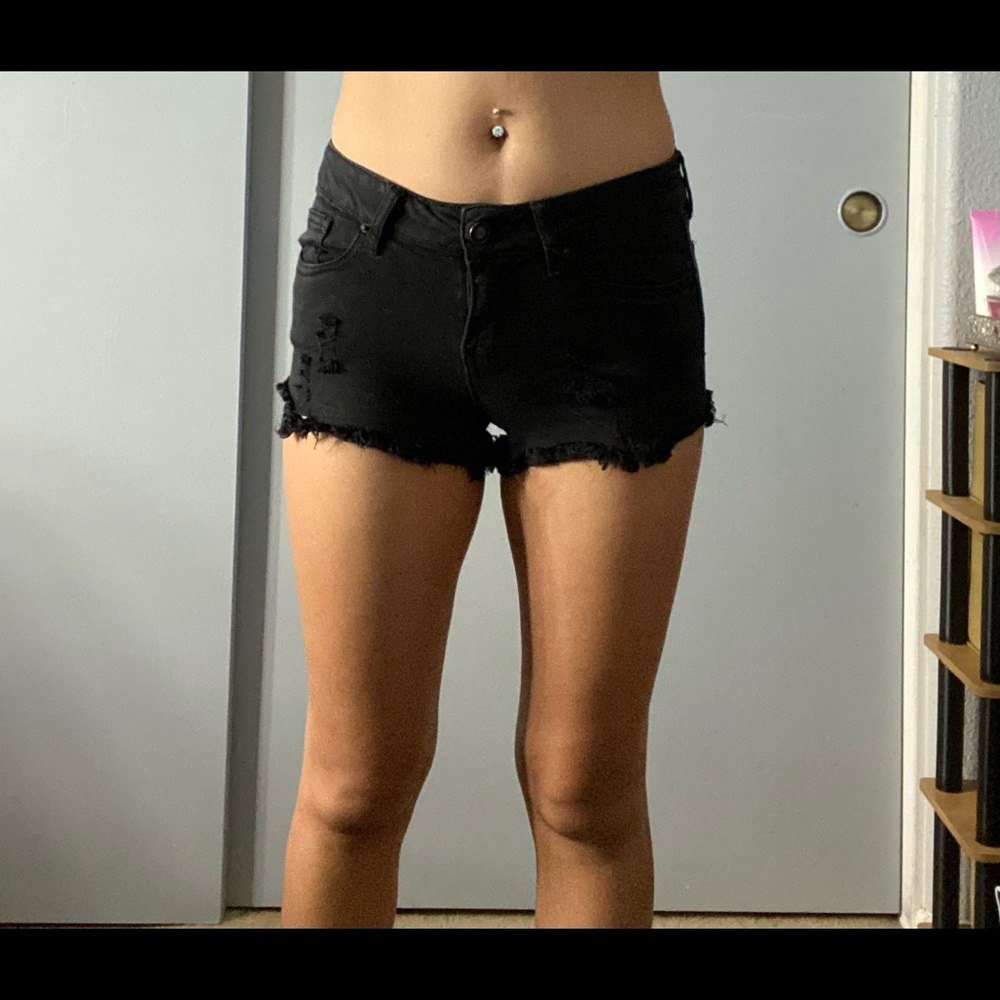 Black ripped shorts